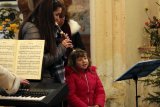Zpívání koled v hoštickém kostele